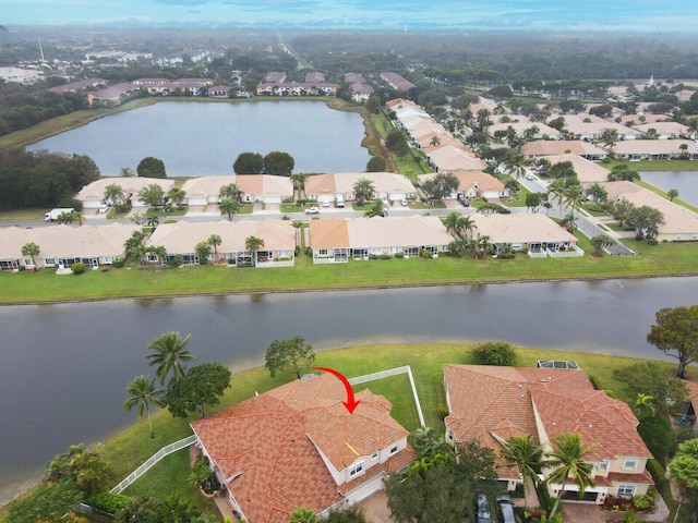 bird's eye view with a water view