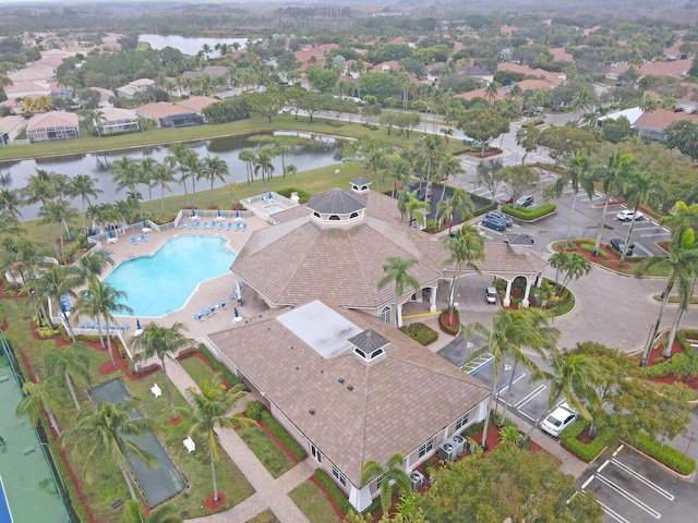 drone / aerial view with a water view