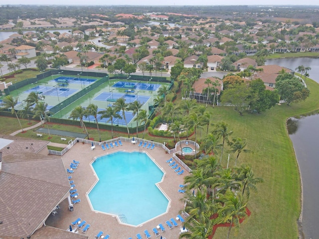 view of pool with a water view