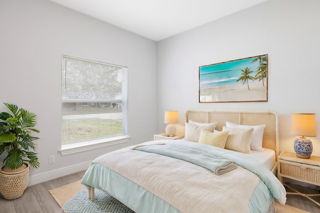 bedroom with light hardwood / wood-style floors