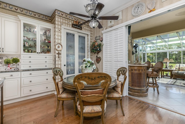 dining room featuring light wood-type flooring and ceiling fan