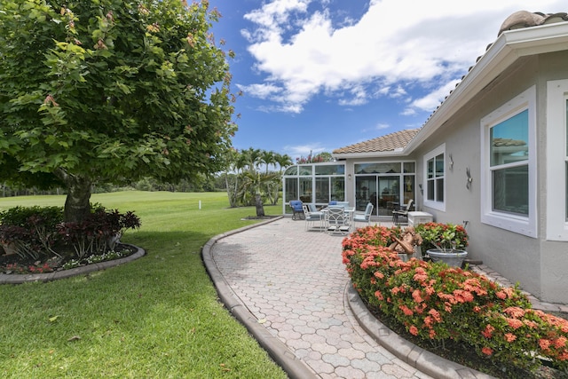 view of yard with a patio area