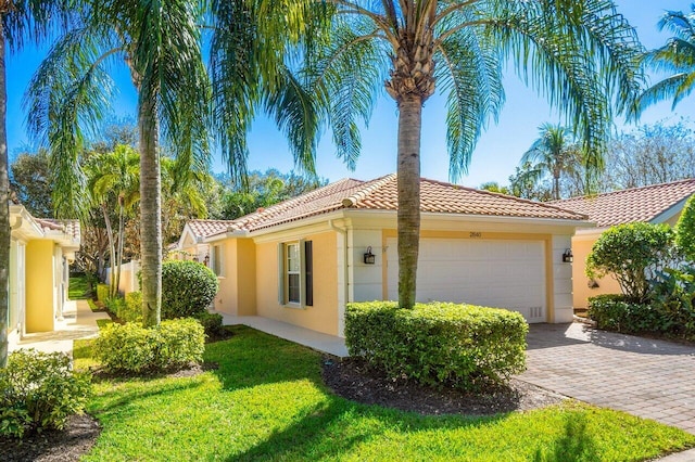 view of property exterior with a yard and a garage