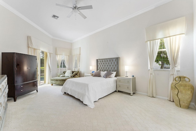 bedroom with crown molding, light carpet, and ceiling fan