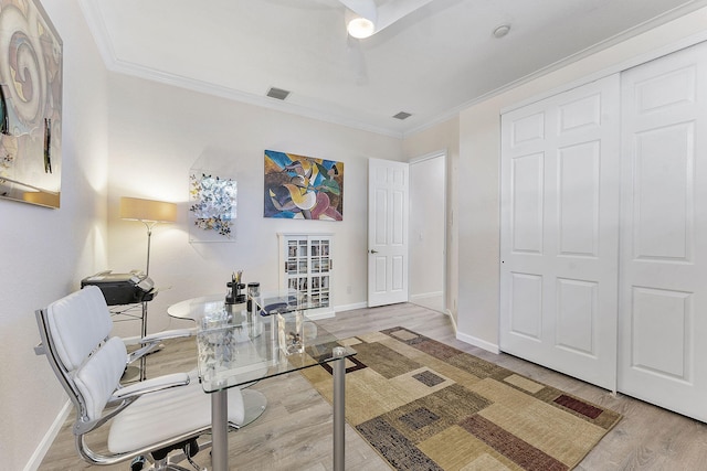 office space with hardwood / wood-style flooring and ornamental molding