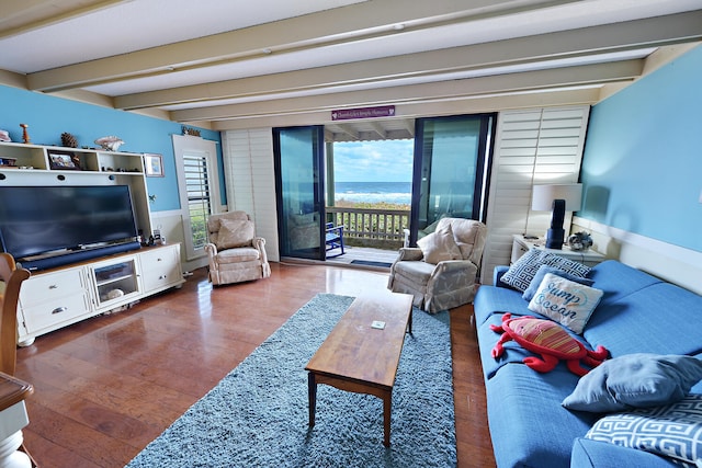 living room with hardwood / wood-style floors and beamed ceiling