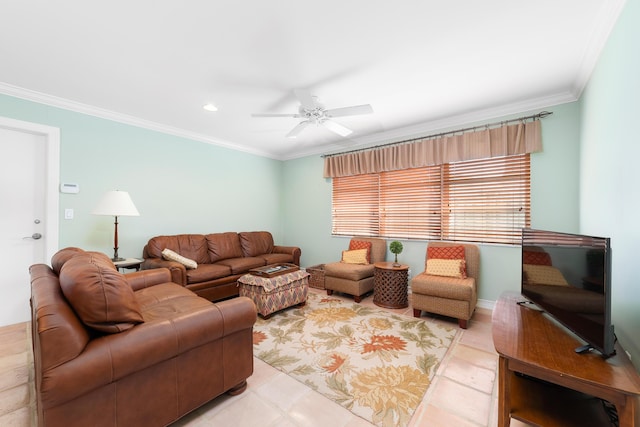 living room with ceiling fan and ornamental molding