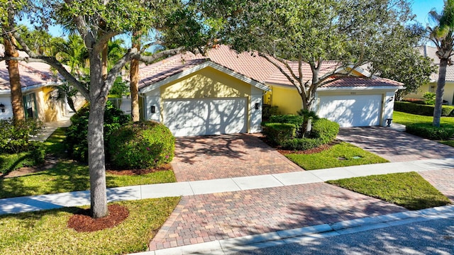 view of front of property with a garage