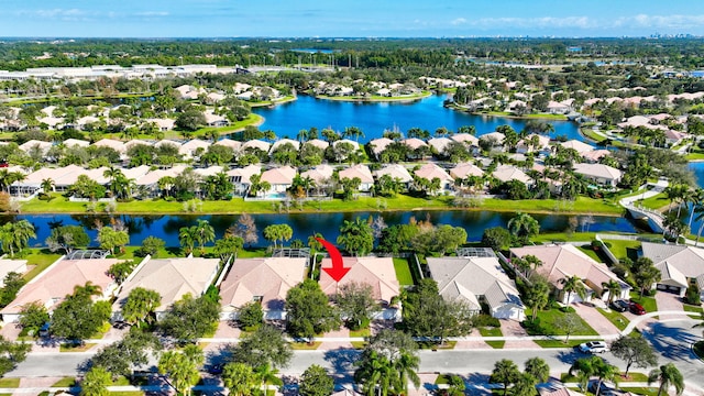 drone / aerial view featuring a water view