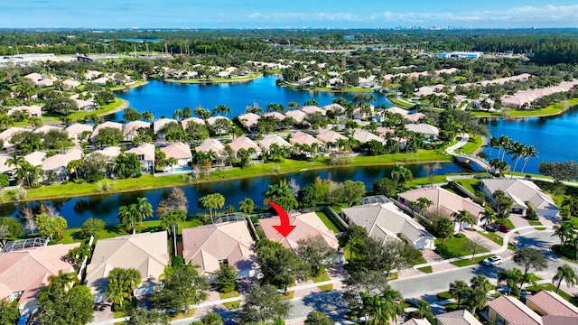 drone / aerial view with a water view