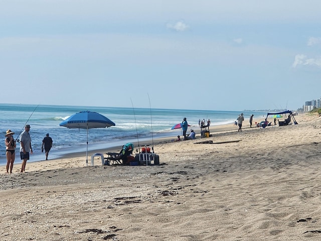 view of water feature with a beach view