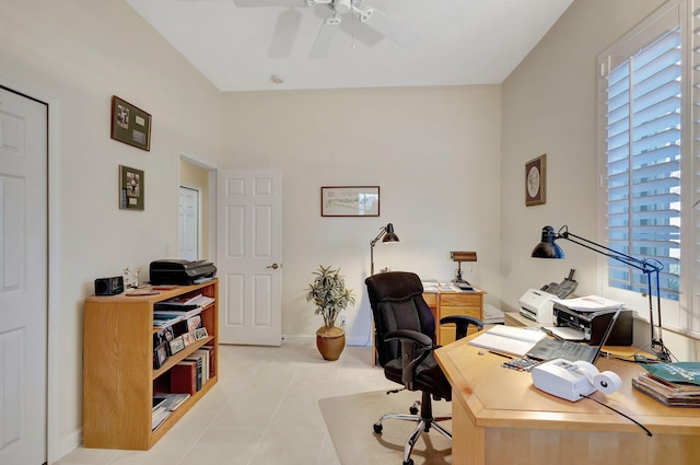 office with ceiling fan and light tile patterned floors