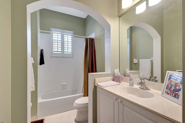 full bathroom featuring tile patterned flooring, vanity, toilet, and shower / tub combo