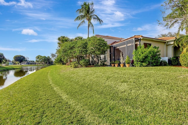 view of yard featuring a water view