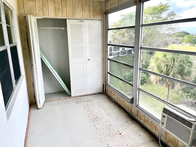 unfurnished sunroom featuring a wealth of natural light