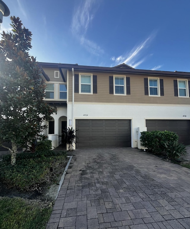 view of front of property with a garage