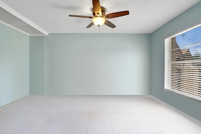 unfurnished room with a textured ceiling and ceiling fan