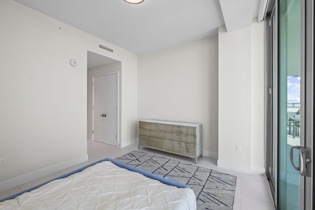 bedroom with floor to ceiling windows