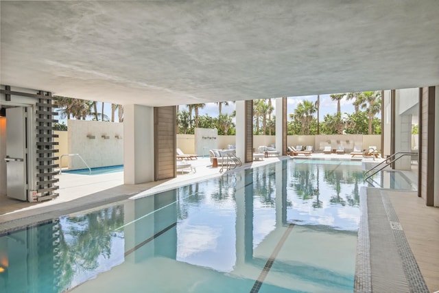 view of swimming pool featuring a patio