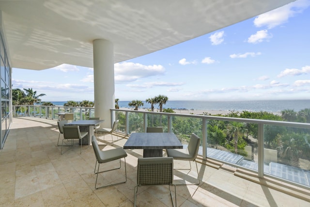 balcony featuring a water view