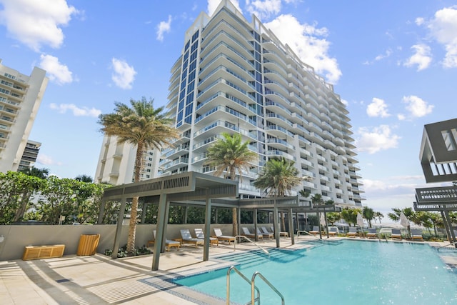 view of swimming pool featuring a patio