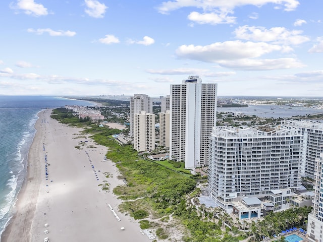 drone / aerial view with a view of the beach and a water view