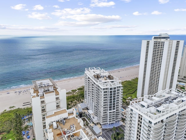 aerial view featuring a beach view and a water view