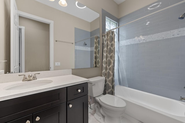 full bathroom featuring vanity, shower / bath combination with curtain, and toilet