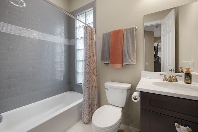 full bathroom featuring tile patterned floors, vanity, shower / bath combination with curtain, and toilet