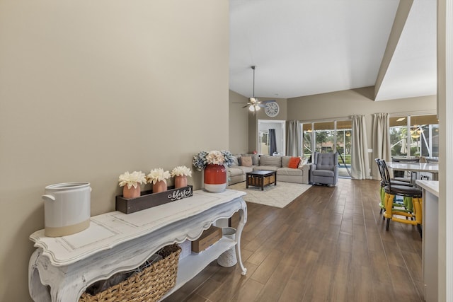 dining room with ceiling fan and dark hardwood / wood-style flooring