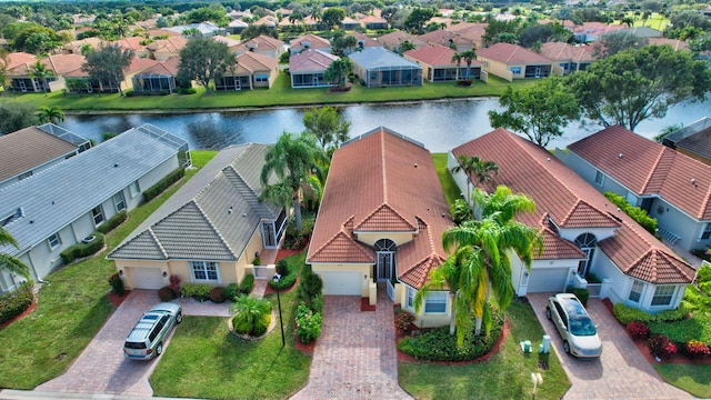 birds eye view of property featuring a water view