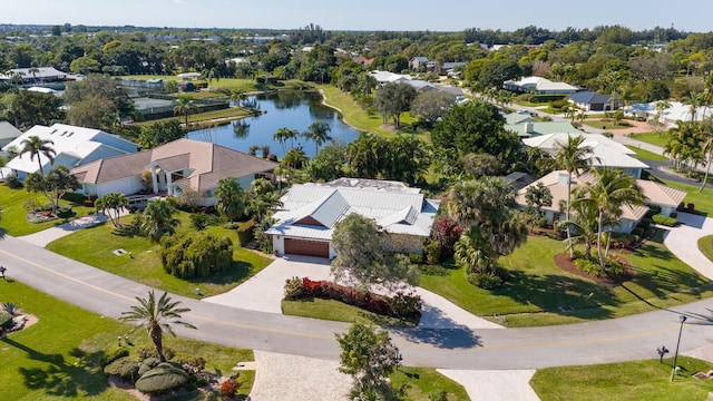 drone / aerial view with a water view