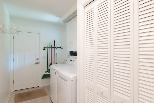 laundry room featuring independent washer and dryer