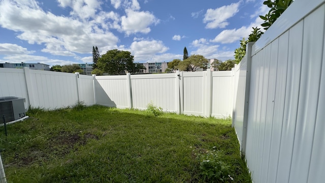 view of yard featuring central AC unit