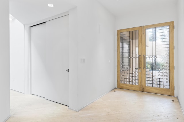 foyer featuring french doors