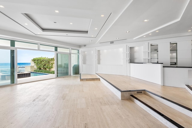 building lobby featuring a water view