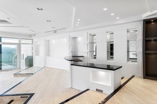 kitchen featuring white cabinets