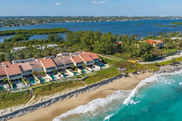 aerial view featuring a water view and a beach view