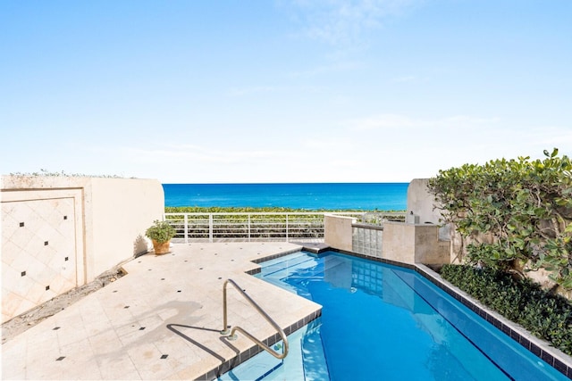 view of pool featuring a water view