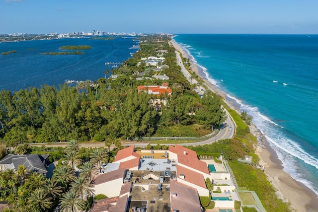 drone / aerial view featuring a view of the beach and a water view