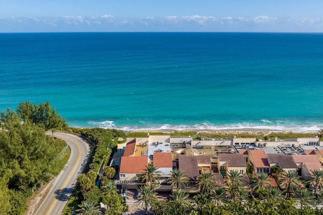 aerial view featuring a water view and a beach view