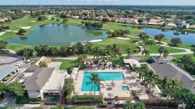 bird's eye view featuring a water view and golf course view