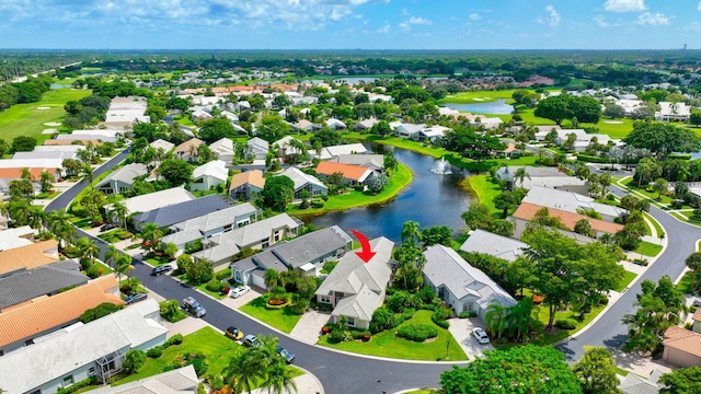 aerial view featuring a water view and a residential view