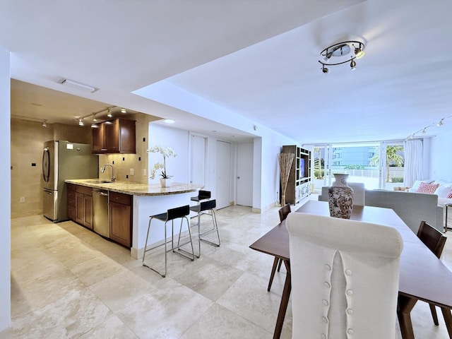 dining space with sink