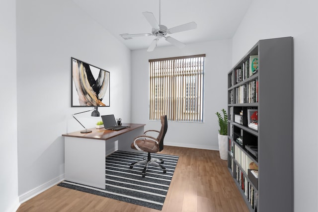 office with ceiling fan and hardwood / wood-style floors