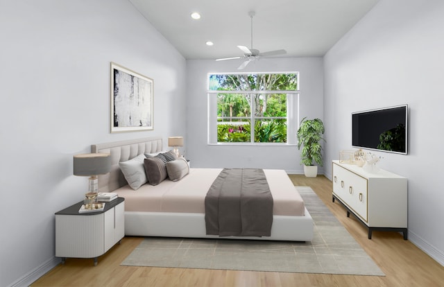 bedroom featuring ceiling fan and light wood-type flooring