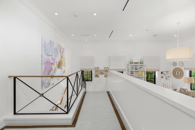 hallway with crown molding