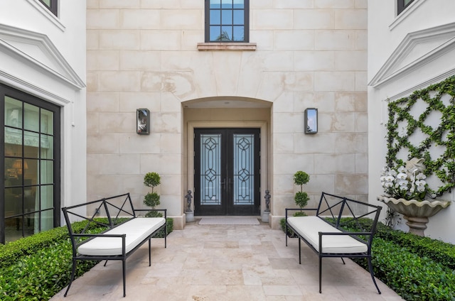 doorway to property with a patio