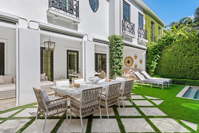 view of patio / terrace featuring a balcony