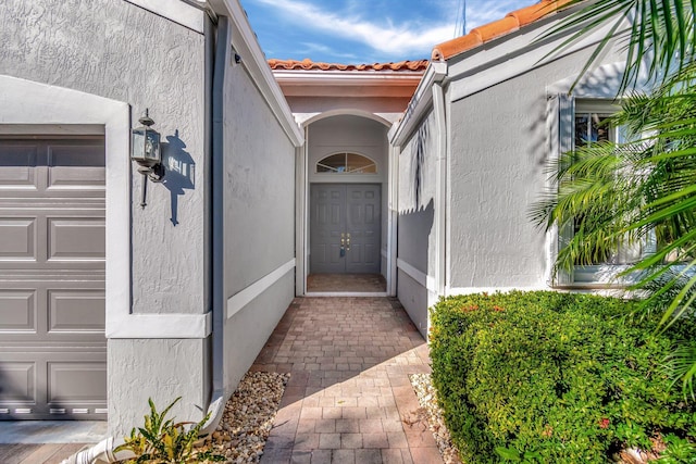 property entrance featuring a garage